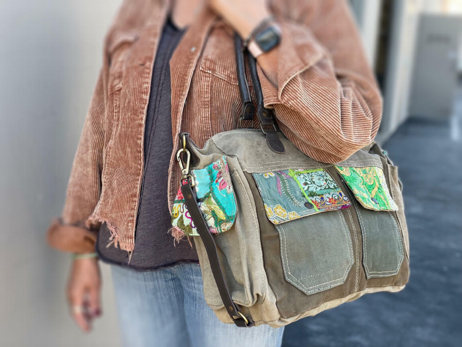 Recycled military tent shoulder bag with colorful patch front and adjustable shoulder strap