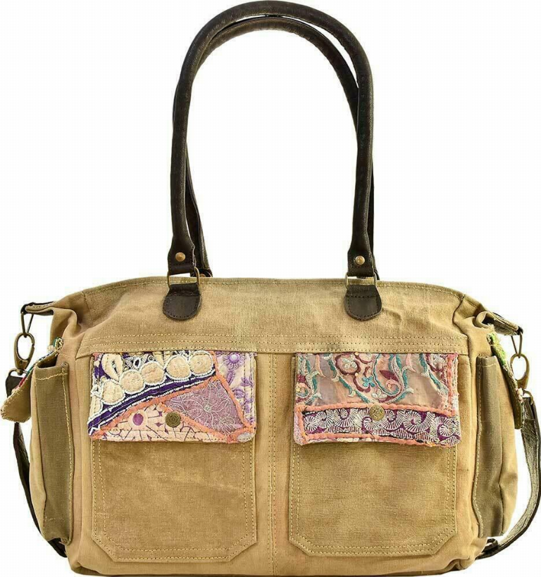 Recycled military tent shoulder bag with tan front panels and colorful patch detail
