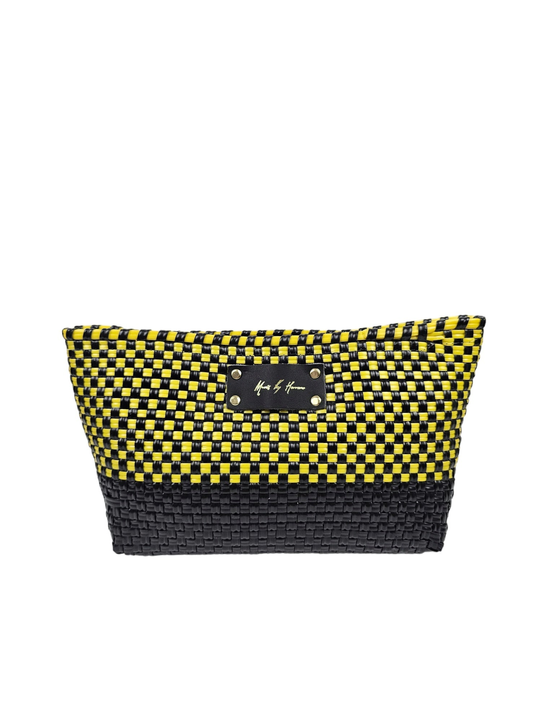 Woven clutch purse with yellow and black checker front panel and rectangular label