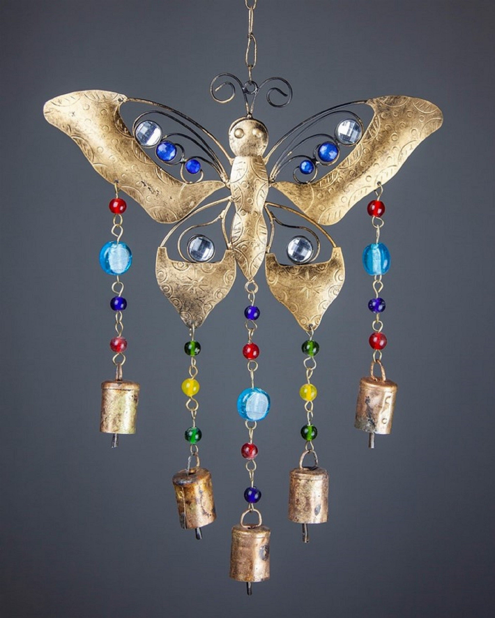 Butterfly wind chime with brass wings, blue glass beads, and six hanging metal bells