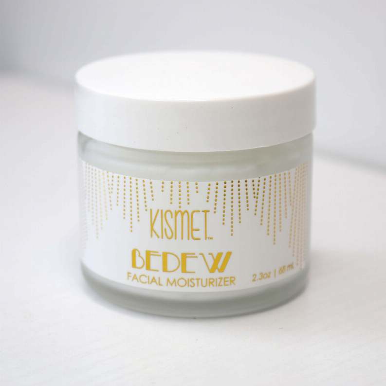 Facial moisturizer jar with white cap and gold KISMET BEDew label