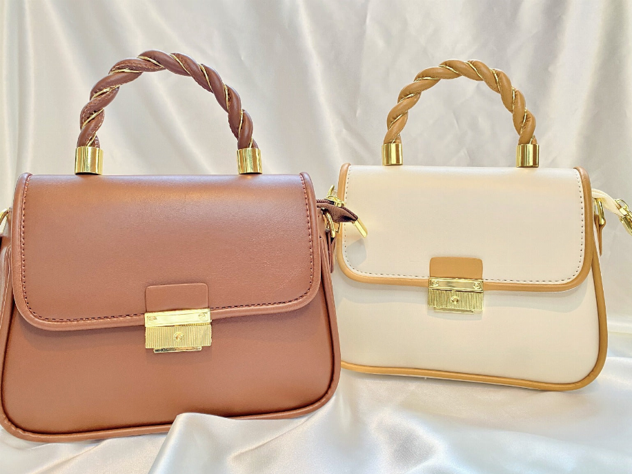 Flap crossbody bags with braided handles and gold clasps—brown and light