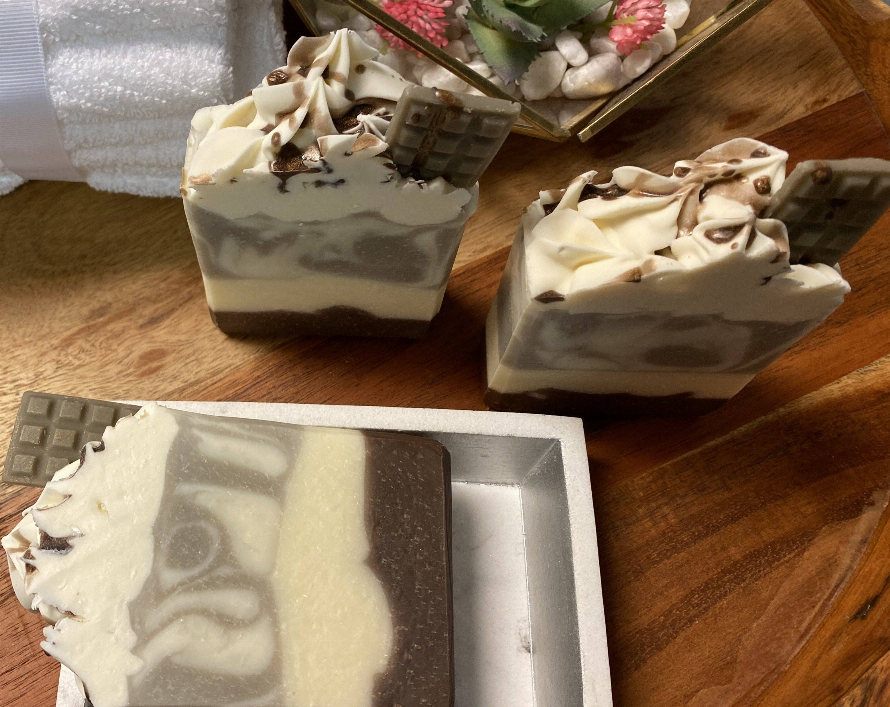 Soap bars, creamy white swirls with dark brown chocolate chunks, gift tray view