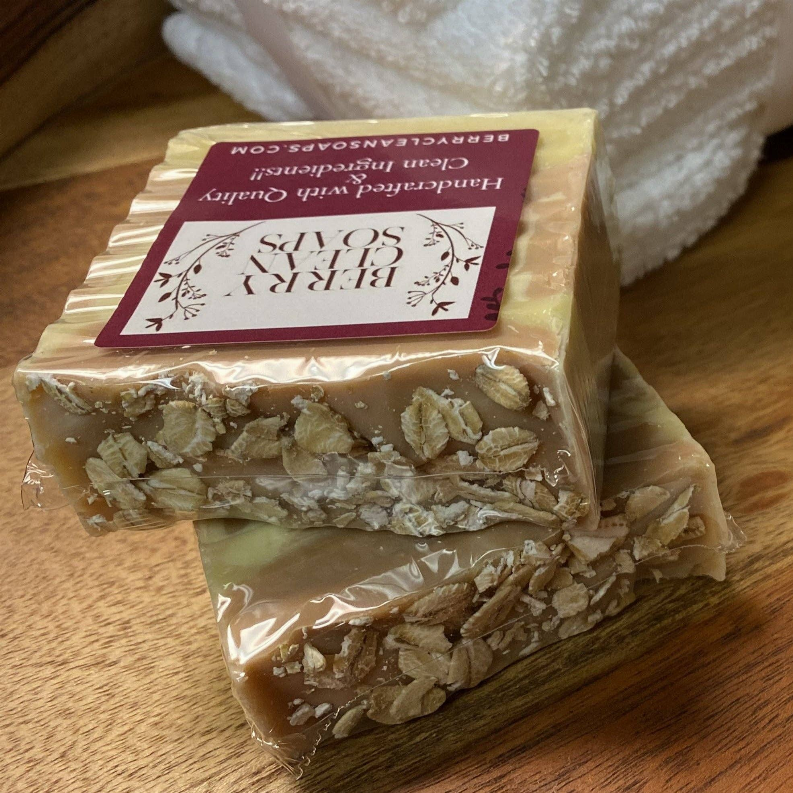 Almond oats soap bar with visible oat flakes, wrapped in clear plastic