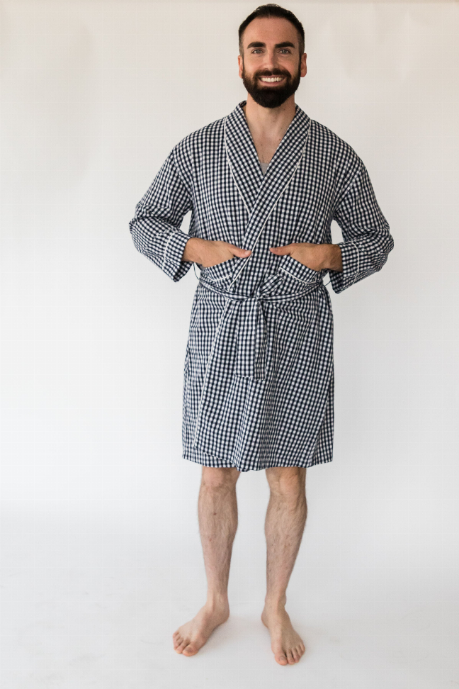Men's navy gingham robe with V-neck and front tie belt, short robe length on model
