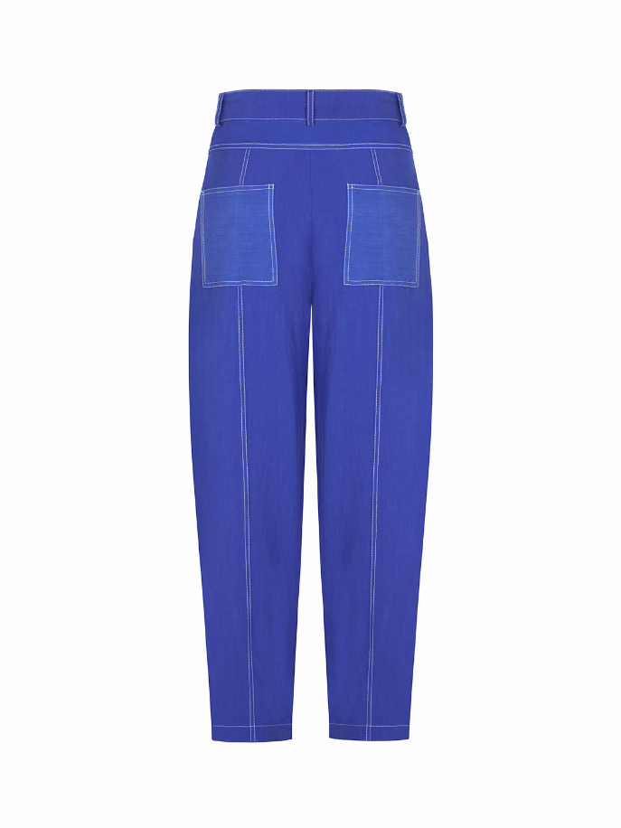 Royal blue linen carrot pants, back view with patch pockets and contrast topstitching