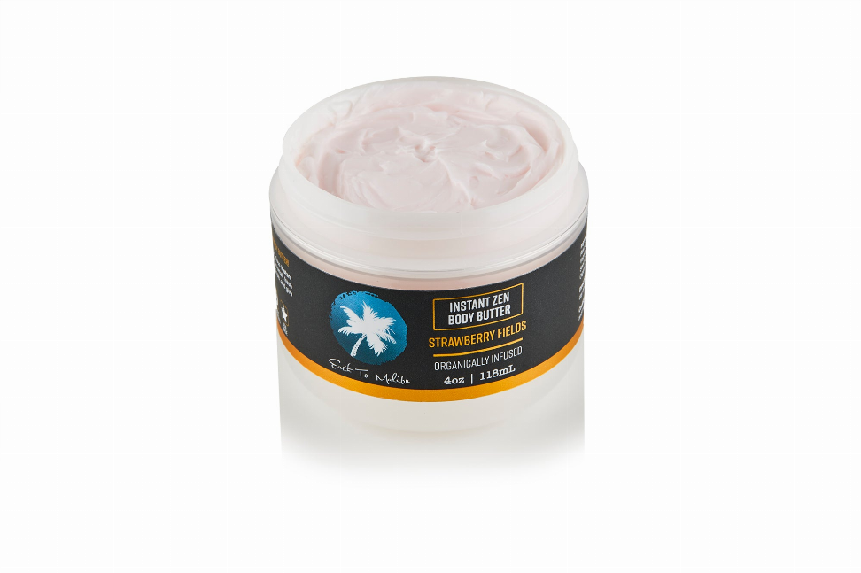 Instant body butter jar filled with pink cream, white lid, and orange label band