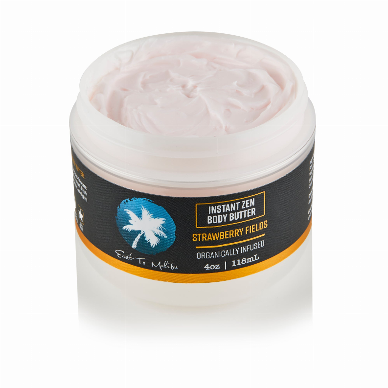 Body butter jar with white lid, Strawberry Fields label, pink whipped butter inside.