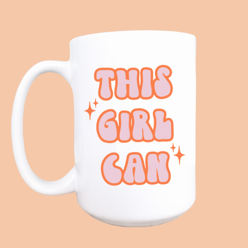 Ceramic coffee mug with orange 'This girl can' slogan design