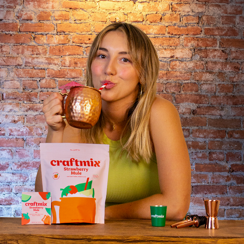 Strawberry mule drink kit with craftmix sachet, copper mug, and glass