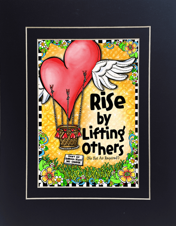Framed motivational print with red hot air balloon and 'Rise by Lifting others' quote