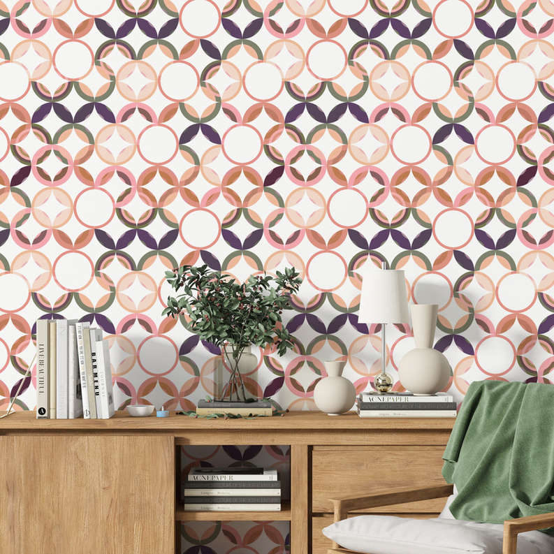 Boho wallpaper with repeating circular geometric floral pattern in coral, tan, navy, and sage