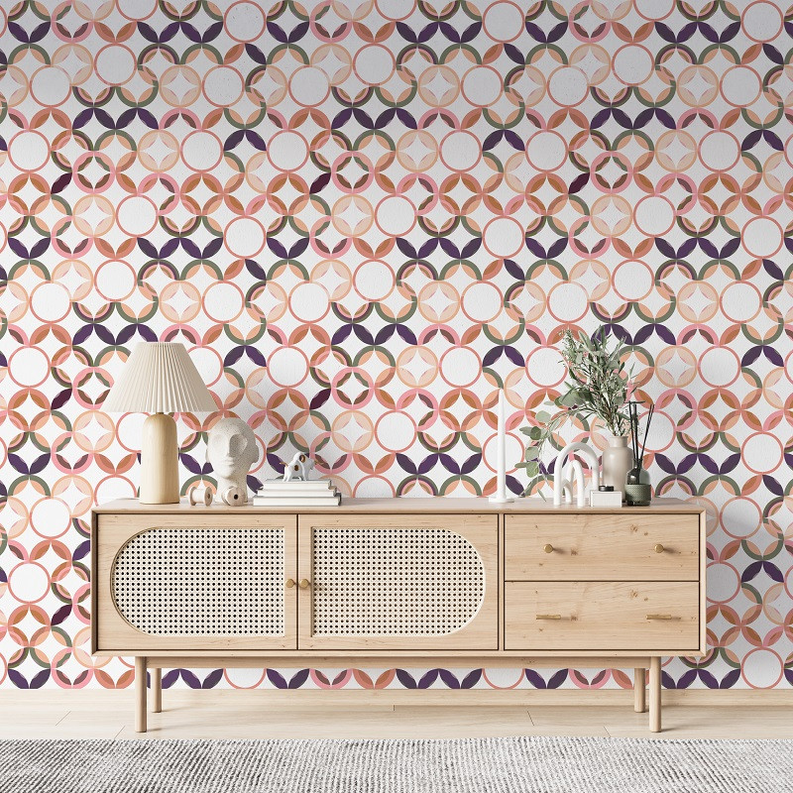 Peel-and-stick wallpaper panel with multicolor circular geometric floral pattern in coral and navy