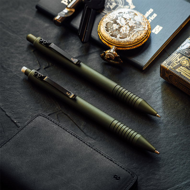 Olive green ballpoint pen with ridged grip and black clip, two-pack view