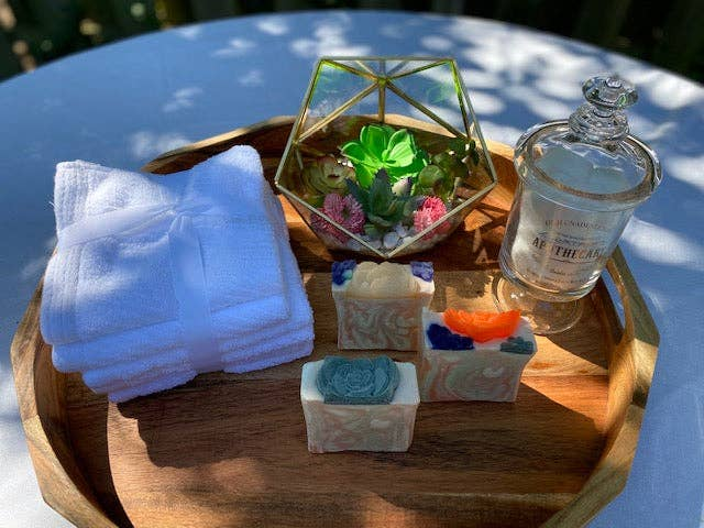 Succulent-shaped berry soap bars in pastel square boxes with teal, blue, and orange tops