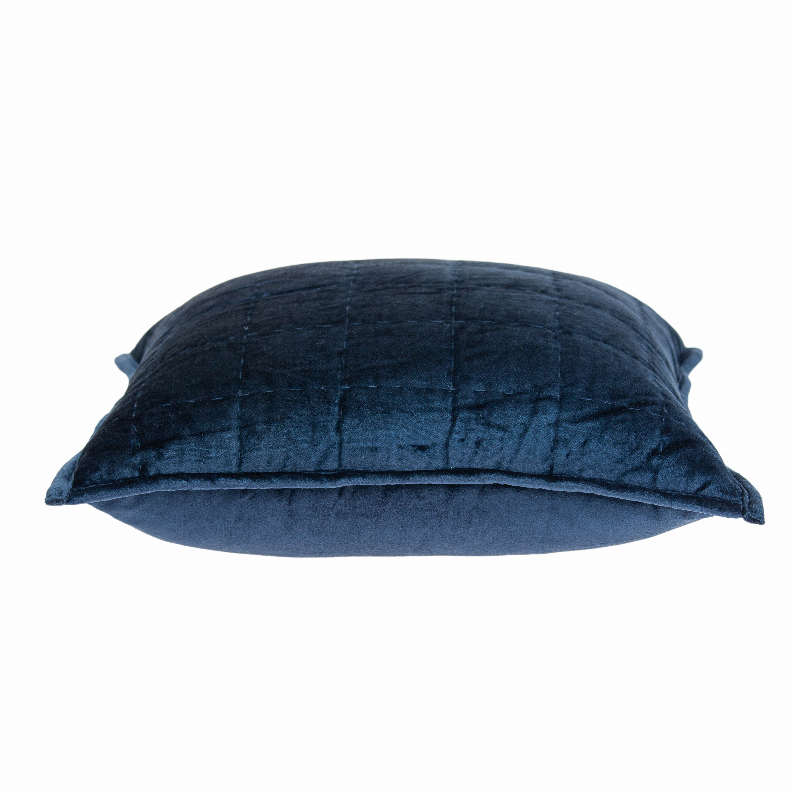 Navy blue quilted throw pillow, rounded shape with side tabs