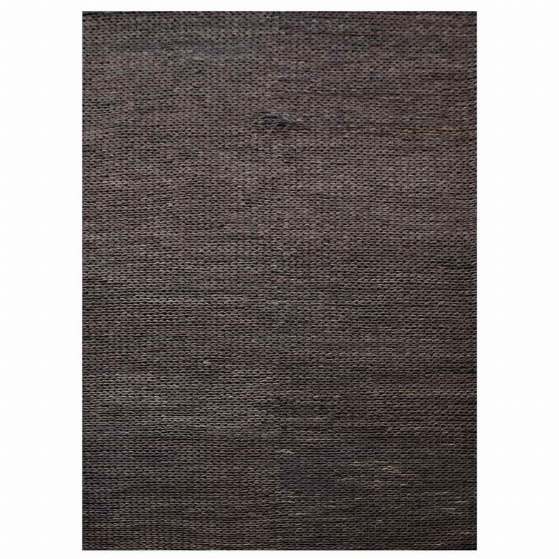 Hand-woven jute area rug close-up, dark charcoal brown woven pattern and texture