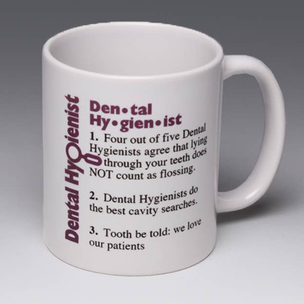 White ceramic dental hygienist mug with maroon themed text and list on front