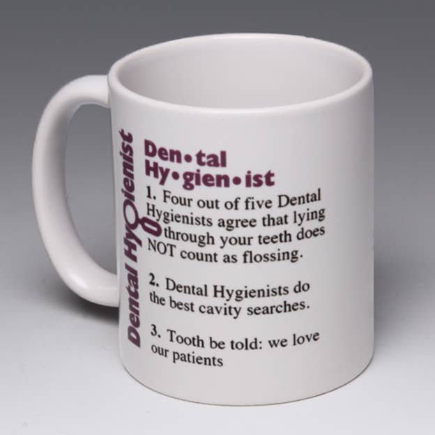 White ceramic dental hygienist mug with maroon front text and numbered sayings