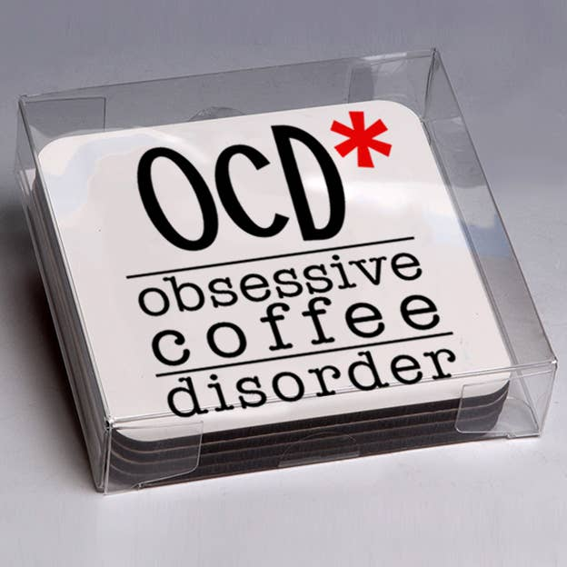 Boxed set of 4 coasters in a clear case, black “OCD obsessive coffee disorder” design