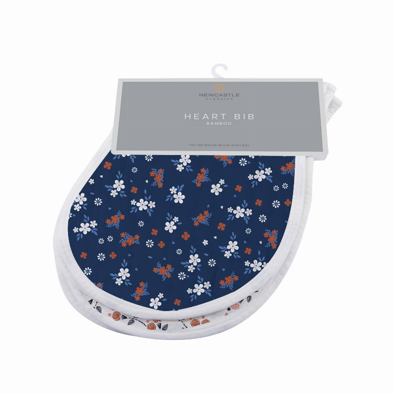 Heart bib with navy floral pattern and light trim