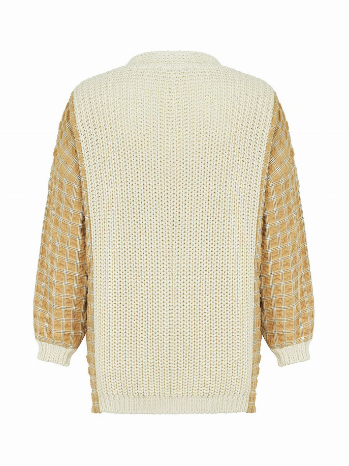 Back view of cream knit cardigan with yellow plaid sleeves and ribbed hem