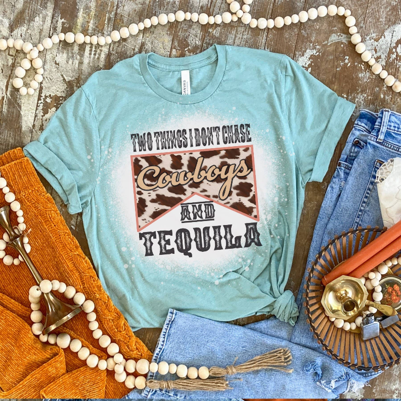 Teal crewneck tee with distressed 'Cowboys and Tequila' print on front