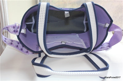 Purple tote bag open top showing gray lining, inner pocket, and straps