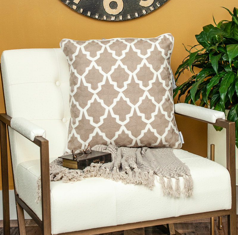 Beige and white star trellis throw pillow with square geometric design