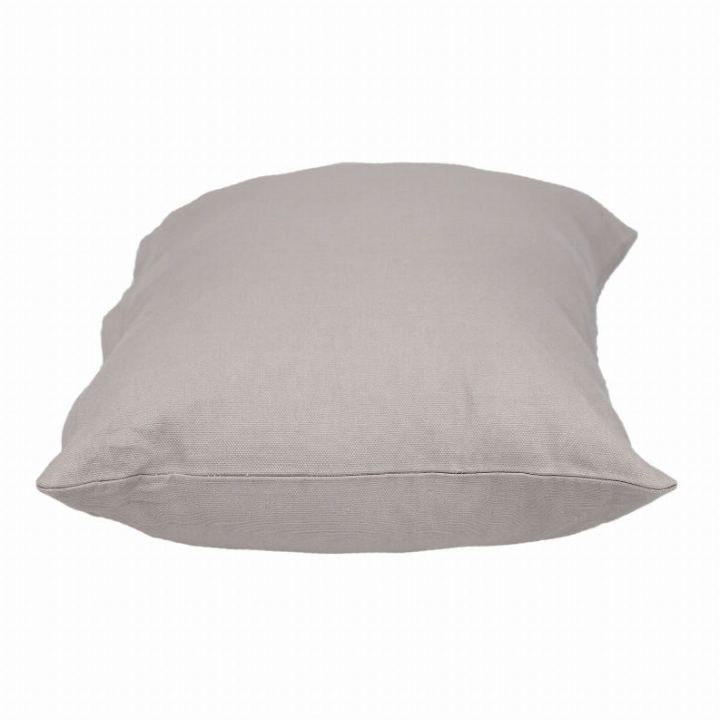 Natural solid lumbar pillow shown from the side with rounded cushion shape