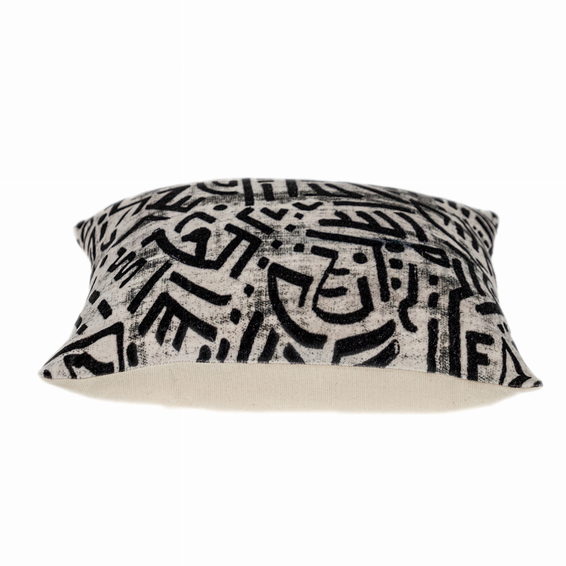Cream and black geometric abstract throw pillow, side profile