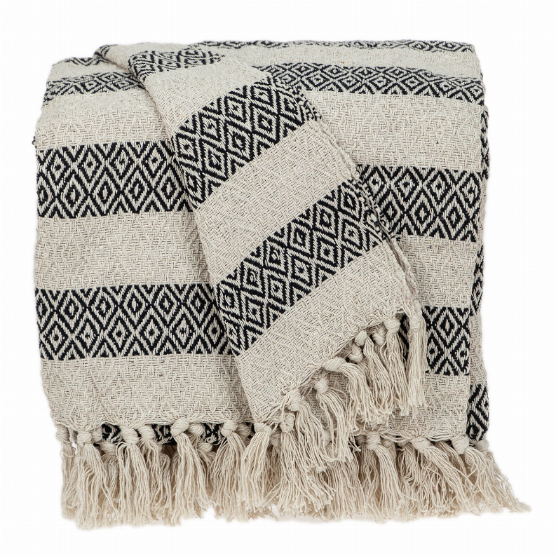 Beige woven blanket throw with black diamond geometric motifs and long tassel fringe