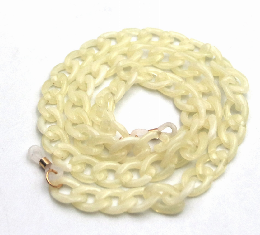 Ivory eyeglasses holder chain, coiled with metal end caps and clasp hook