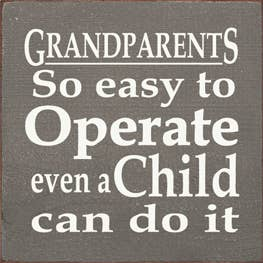 Wood sign featuring 'GRANDPARENTS' and 'even a Child can do it' lettering