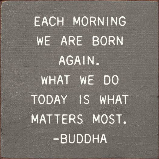 Buddha quote wall art plaque with white text on dark gray background