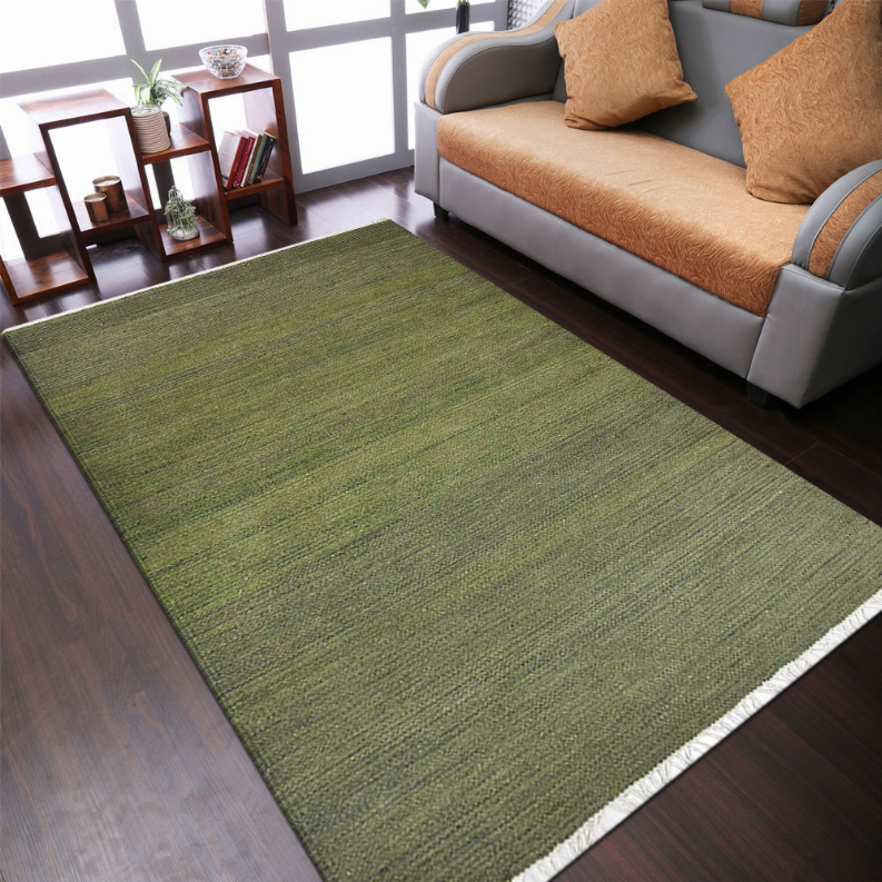 Olive green flat weave wool area rug laid flat with white border detail