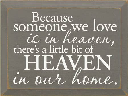Wood sign with quote text, 'HEAVEN' in large letters.