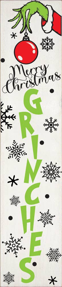 Vertical wood Christmas sign with green stacked letters, red ornament, and snowflakes