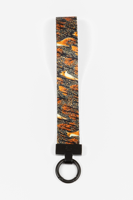 Fox patterned wristlet keychain with orange-and-black fabric strap and black attachment tab