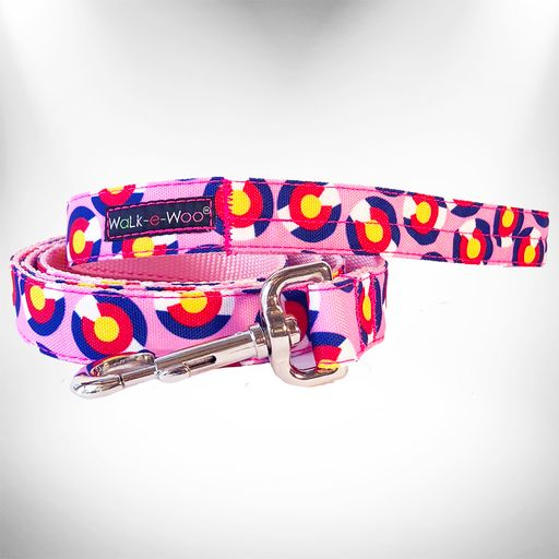 Pink patterned dog lead with Walk-e-Woo tag and metal clasp, adjustable hardware