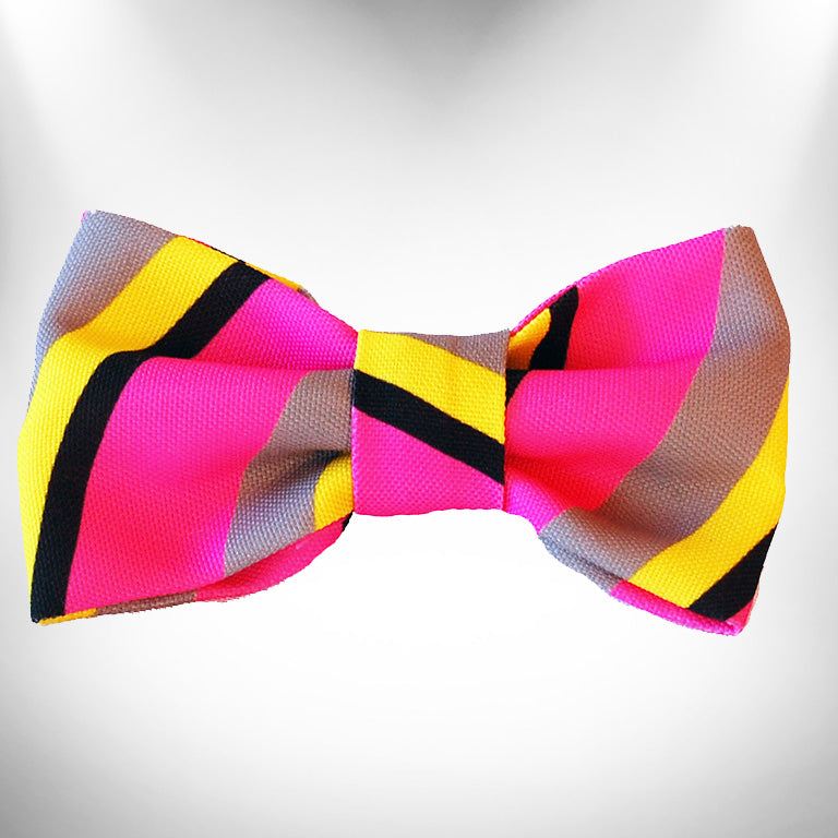 Striped dog bow tie with wide bow, pink, yellow, and black diagonal stripes.