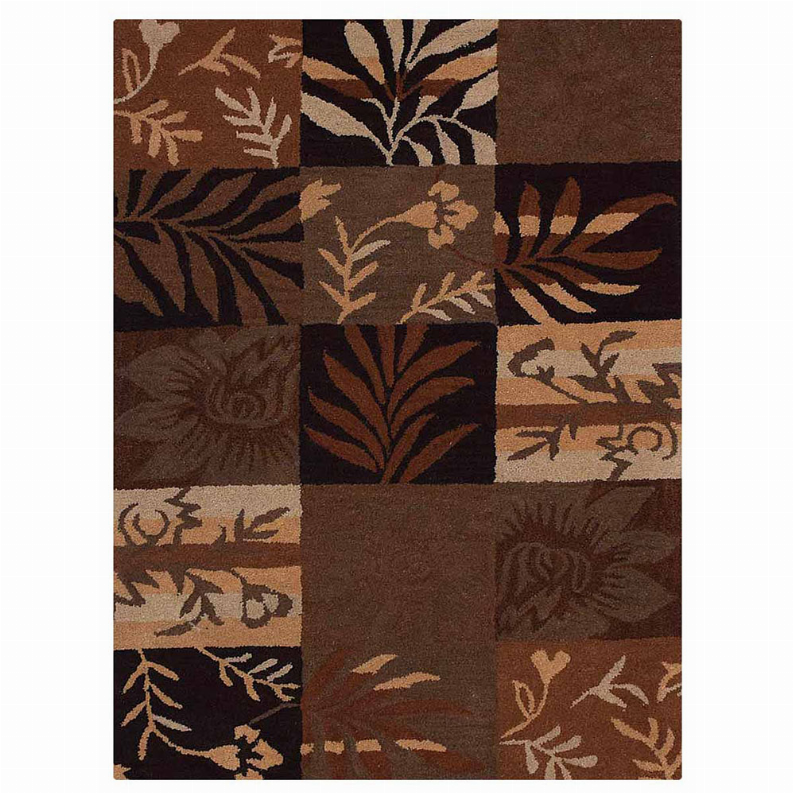 Patchwork botanical area rug with floral and leaf motifs in dark brown and tan