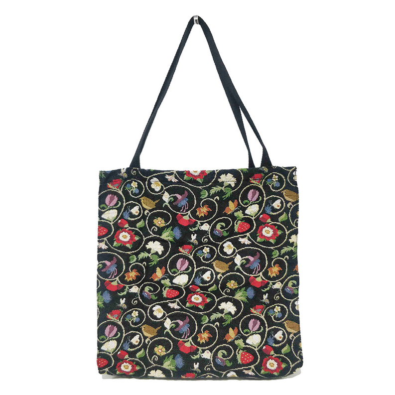 Jacobean-style foldable tote bag with multicolor floral and paisley print, black handles