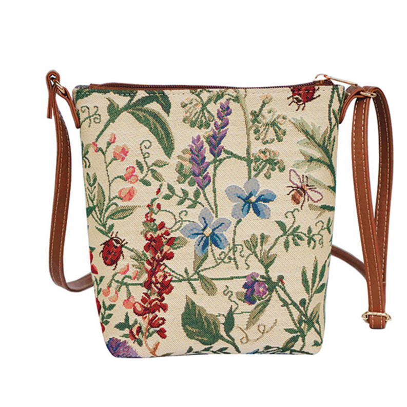 Floral canvas crossbody sling bag with zip top, brown adjustable strap
