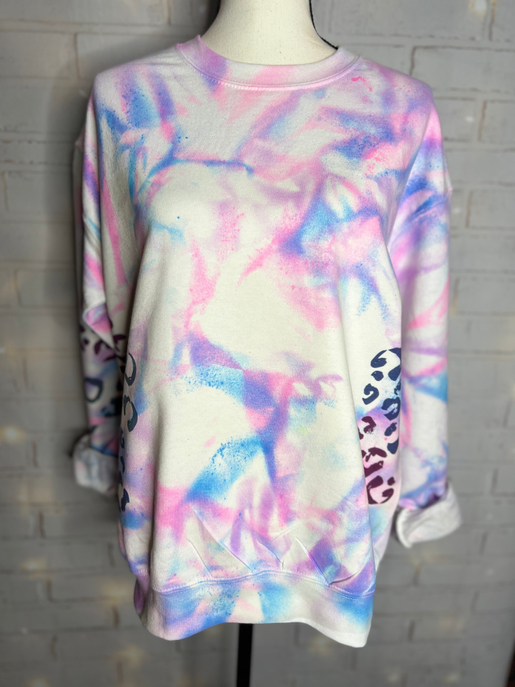 Crewneck neon tie-dye sweatshirt in pink, blue, and white with leopard-print accents