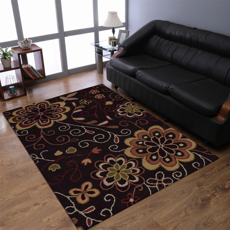 Floral area rug in a living room: dark brown with multicolor flower and vine pattern