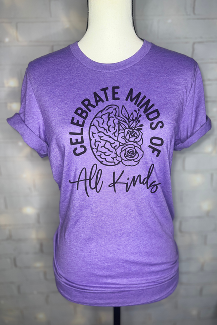 Purple graphic T-shirt with 'Celebrate Minds of All Kinds' brain-and-rose print