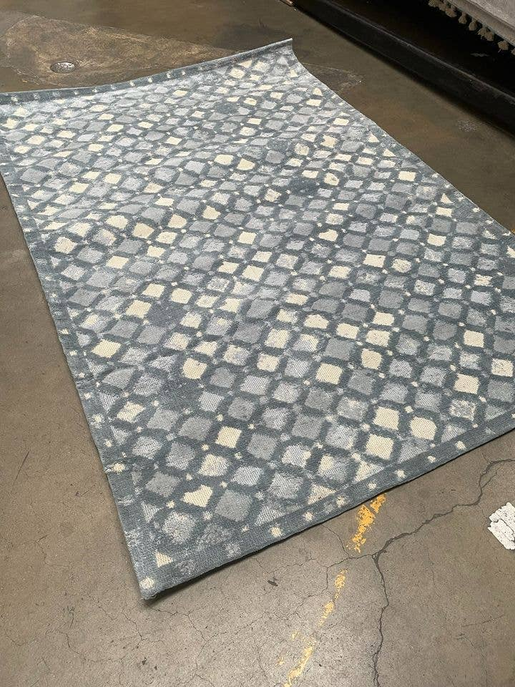 Blue geometric area rug with diamond pattern, handmade look, flatwoven texture