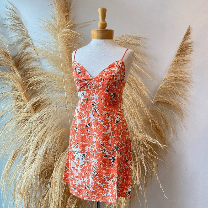 Orange-red floral spaghetti-strap dress with V neckline, fitted silhouette