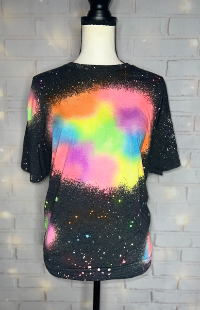Black reverse tie-dye blank tee, short sleeves, multicolor nebula swirl front